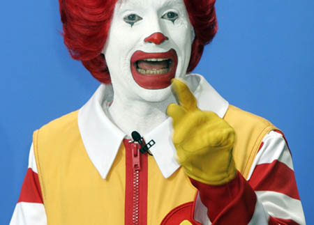 Wie of wat hang óns aan die kruis op?